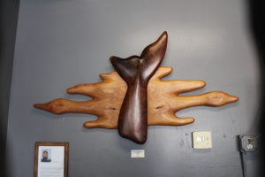whale tail and shore birds